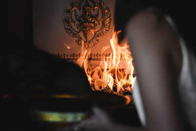 Close-up of fire on table