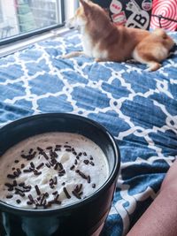 Midsection of man having breakfast on table