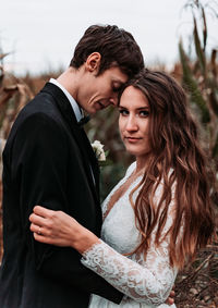 Young couple standing outdoors