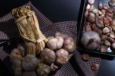 High angle view of garlic on table