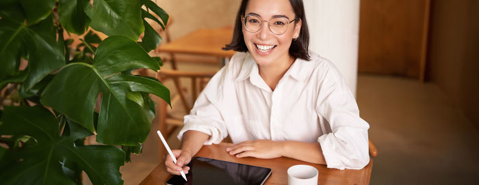 Young woman using mobile phone