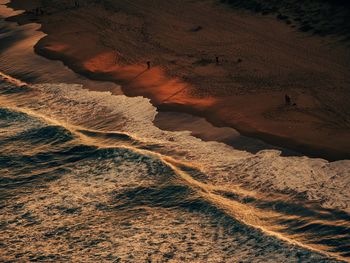 Elevated view of beach at sunset