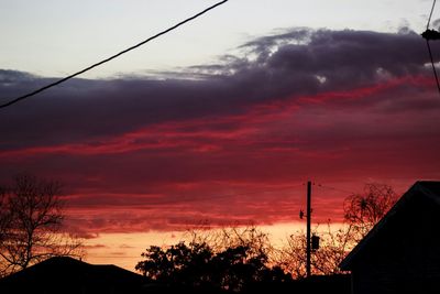 Low angle view of cloudy sky at sunset