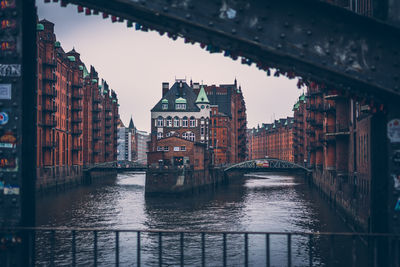 Speicherstadt, city of warehouse, with steel bridge and the canal in cloudy day, hamburg