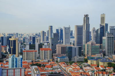 Modern buildings in city against sky