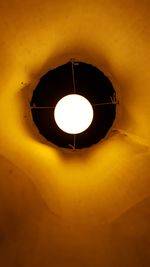 Low angle view of illuminated light bulb