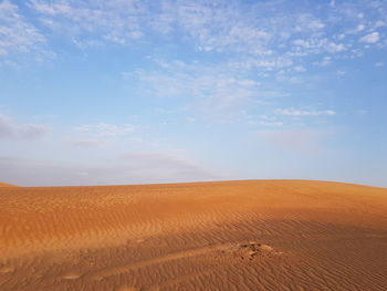 Scenic view of desert against sky