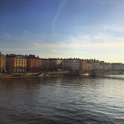 River by city against sky