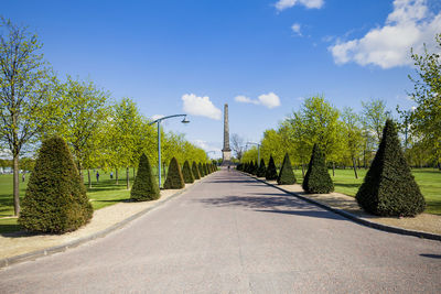 View of the pedestrian road leading to nelson's monument at glasgow green, glasgow, scotland