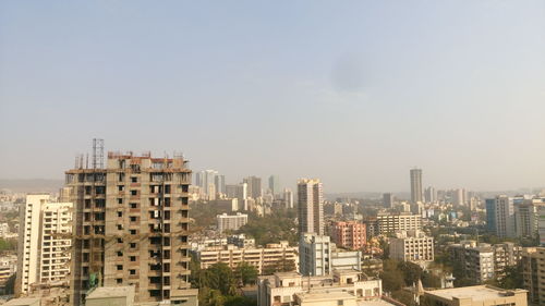 Cityscape against clear sky