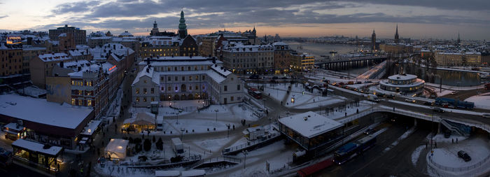 High angle view of city at sunset