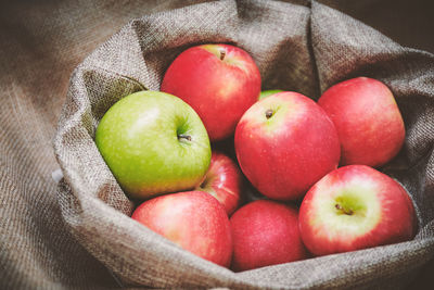 High angle view of apples in container