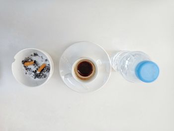 High angle view of coffee cup on table