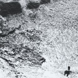 Woman standing in water