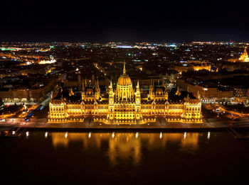 Illuminated buildings in city at night