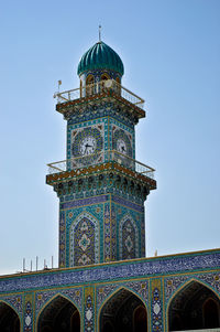 Low angle view of al-kadhimiya mosque against clear sky