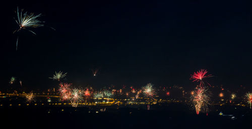 Firework display at night