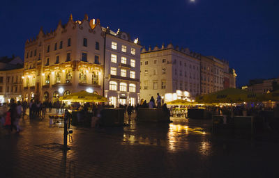 View of illuminated buildings at night