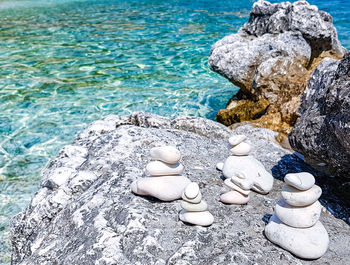 High angle view of pebbles on beach