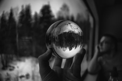 Close-up of woman hand holding ball