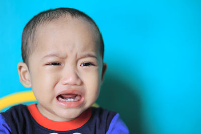Close-up portrait of crying boy