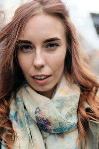 Close-up portrait of smiling woman