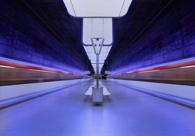 Blurred motion of trains at railroad station