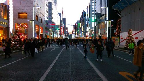 People walking on city street