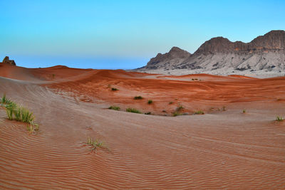 Scenic view of desert against sky