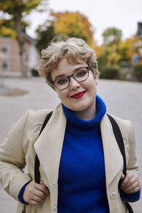 Smiling woman looking at camera