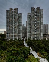 Skyscrapers in city against sky