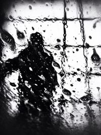 Close-up of water drops on glass