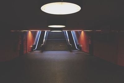 Underground walkway leading towards staircase