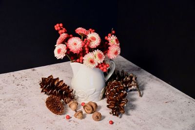 High angle view of flowering plant in vase on table