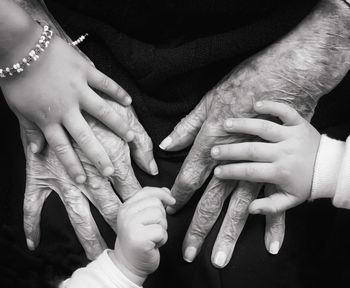 Cropped image of grandparent and kids