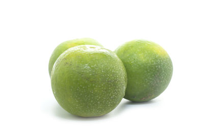 Close-up of fruits against white background