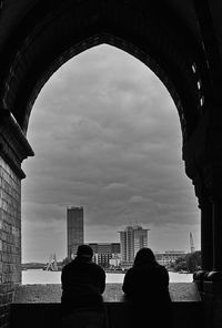 Low angle view of building against cloudy sky