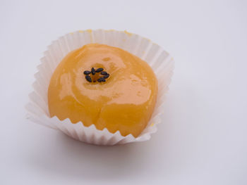 Close-up of sushi on white background