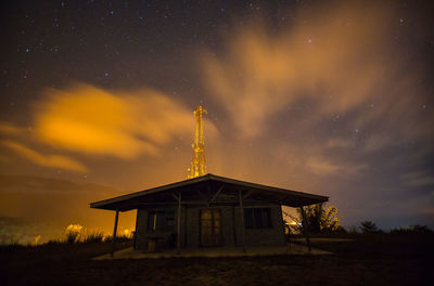 Low angle view of building against sky at night