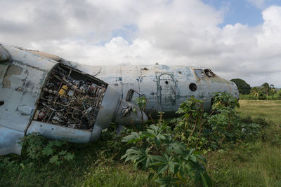 Abonded aeroplane wreck against dramatisch sky