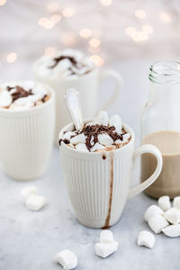 Close-up of coffee cup on table