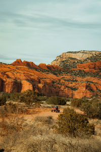 Side by side 4 wheeler driving on forest service road 525 in coconino national forest with red rocks 