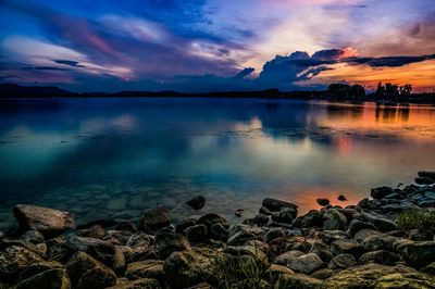 Scenic view of sea against sky at sunset