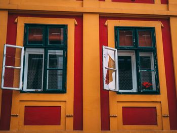 Yellow windows on building