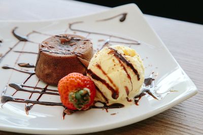 Close-up of cake served in plate on table