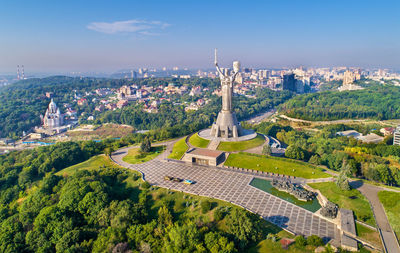 High angle view of buildings in city against sky