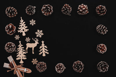 High angle view of candies against black background