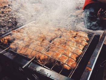 High angle view of food on barbecue grill