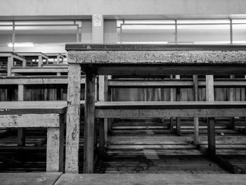 Empty bench in abandoned building