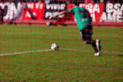 Man playing soccer on field